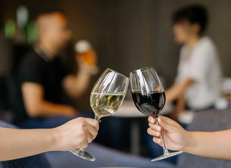 Toast with two wine glasses.