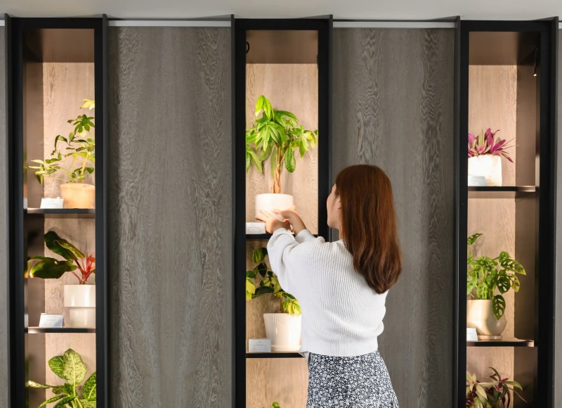 A women at the plant library at Dao by Dorsett AMTD Singapore.