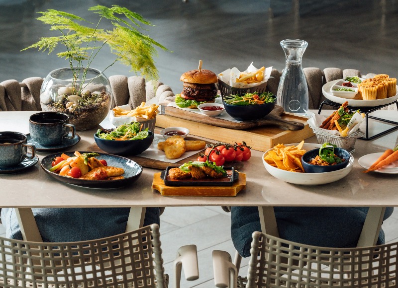 Variety of food on a dining table at Dao by Dorsett AMTD Singapore.