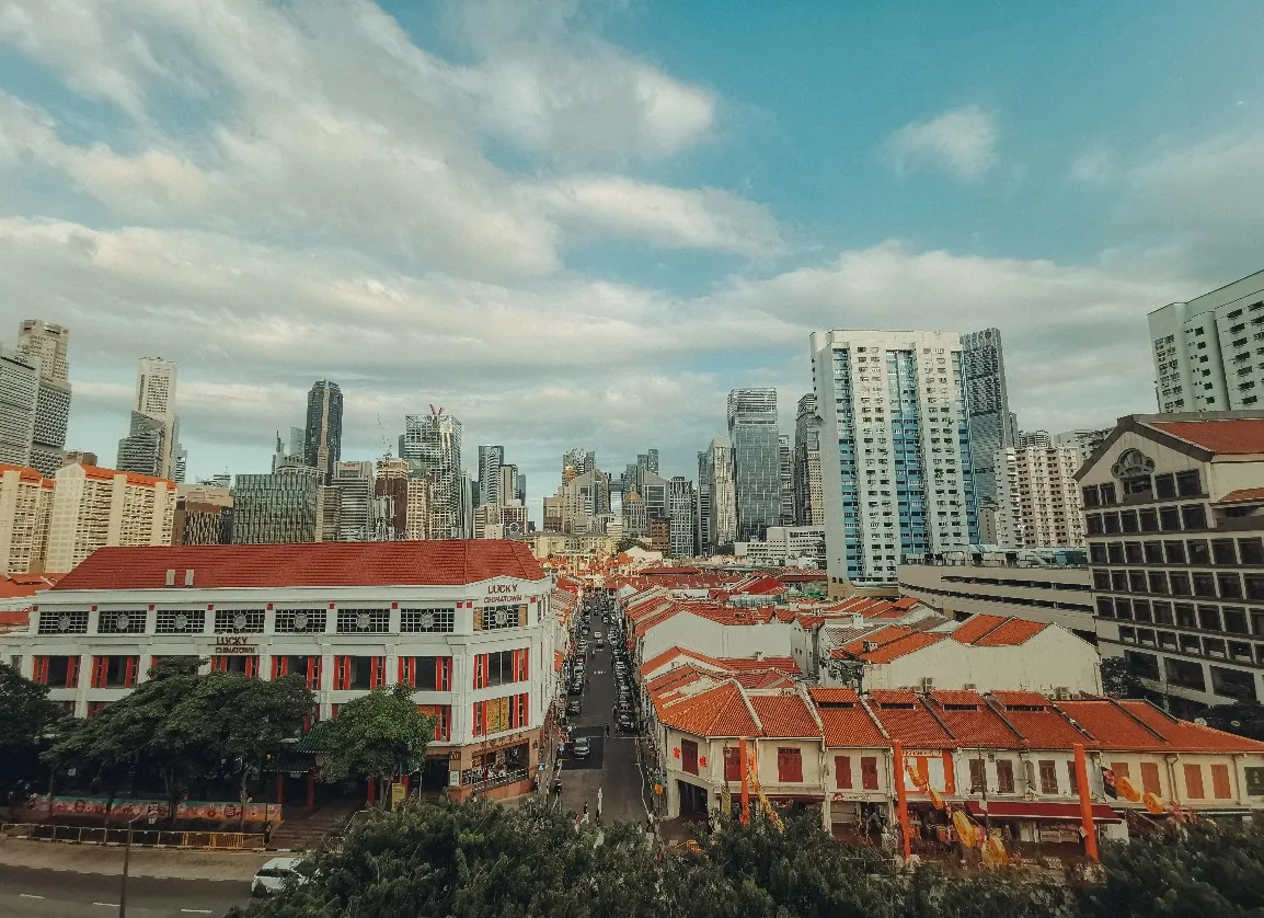 Wide shot of streets and buildings in Singapore.
