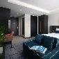 Sofa by bed in the Dao Studio at Dao by Dorsett West London.